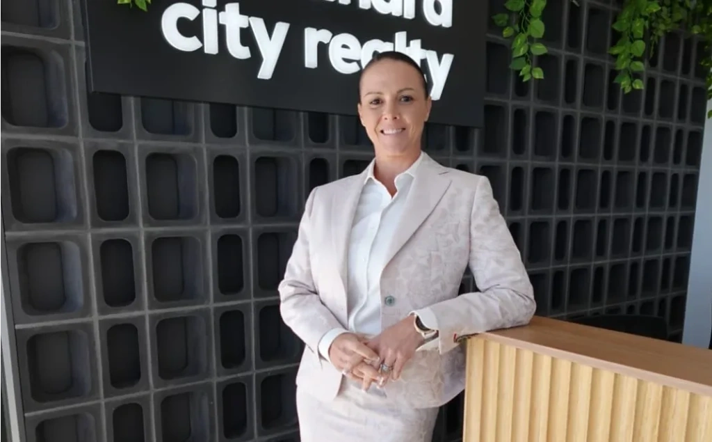 Womens Suit in real estate office