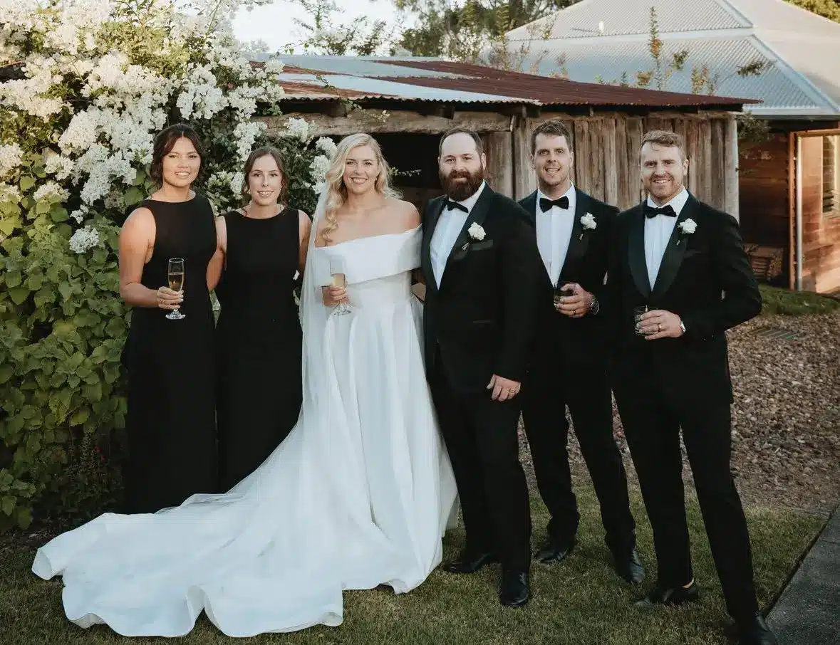 Wedding party in black suits