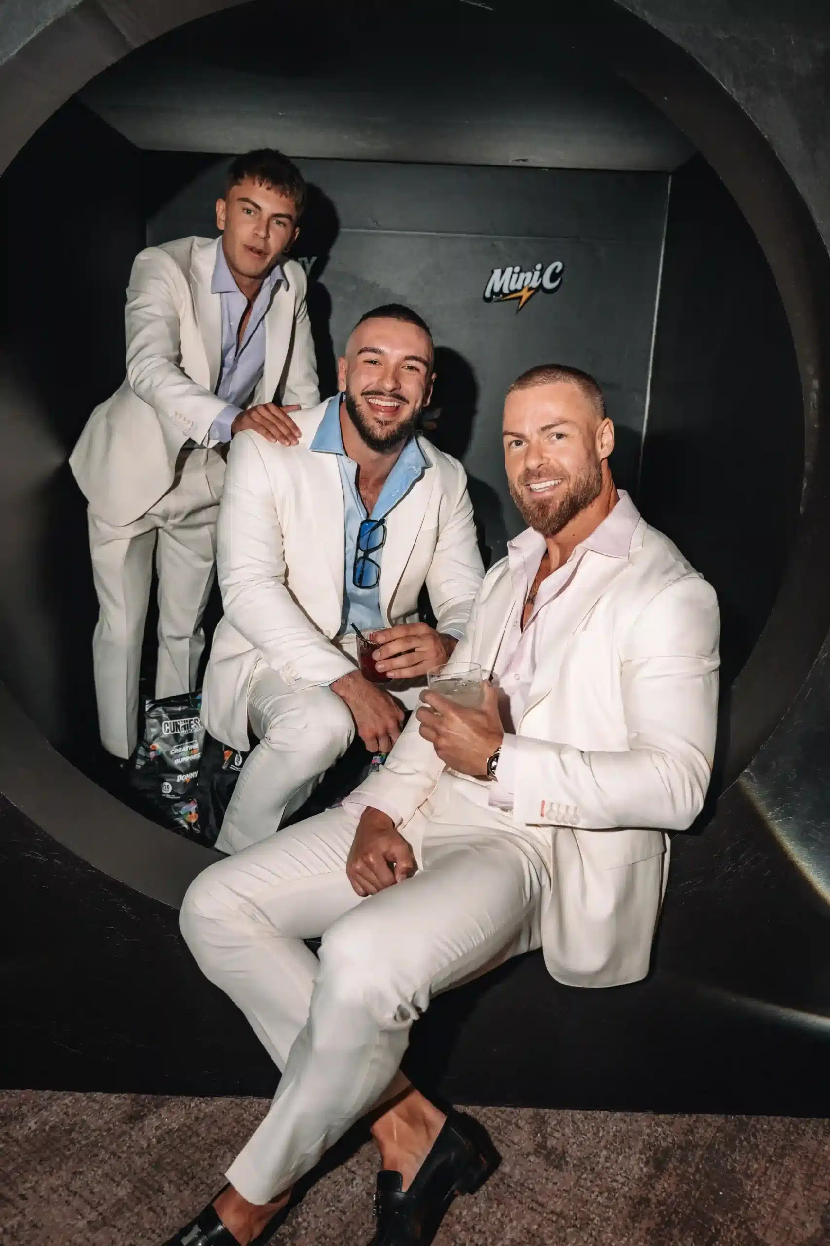 White custom suits styled for a Gold Coast wedding